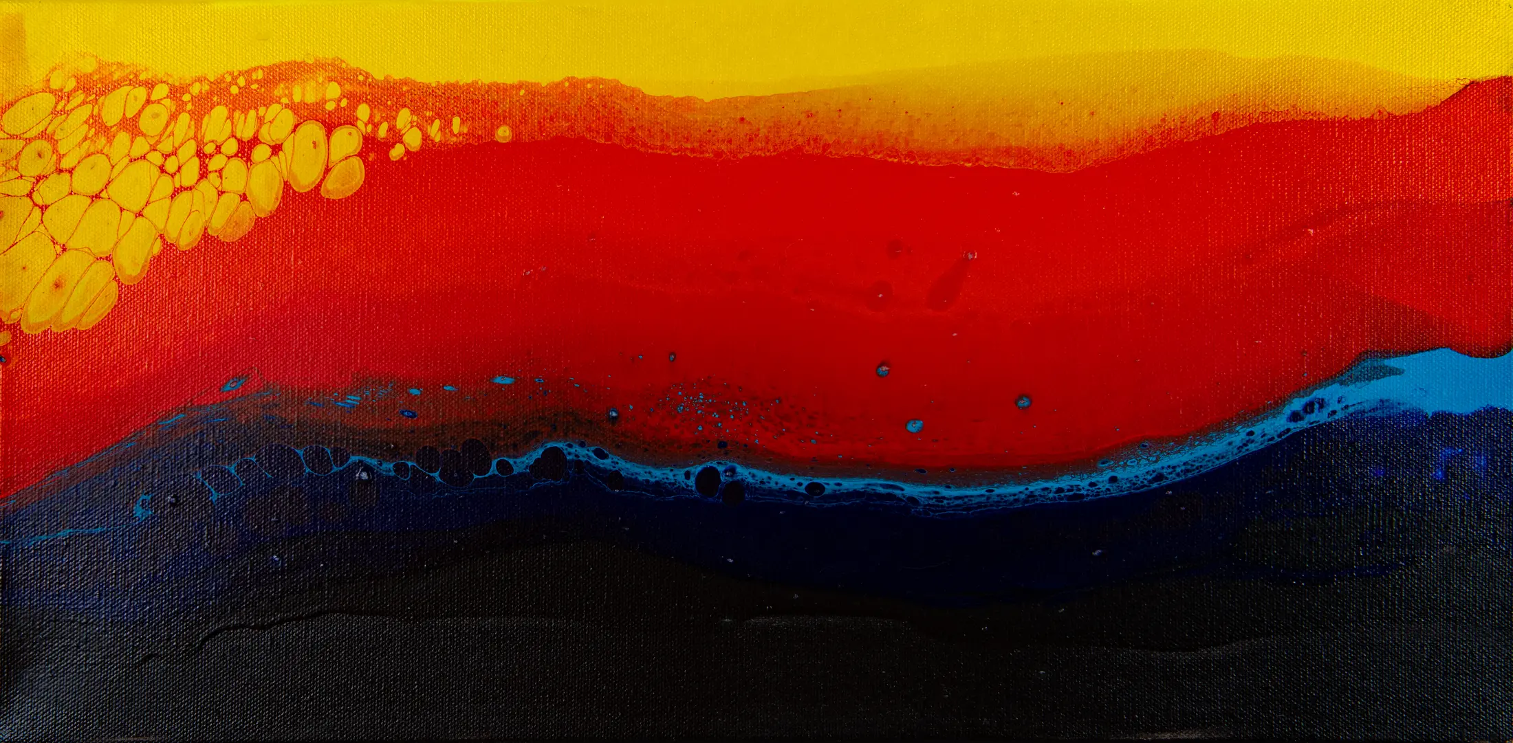 A horizontal abstract painting in yellow, red, black, and blue