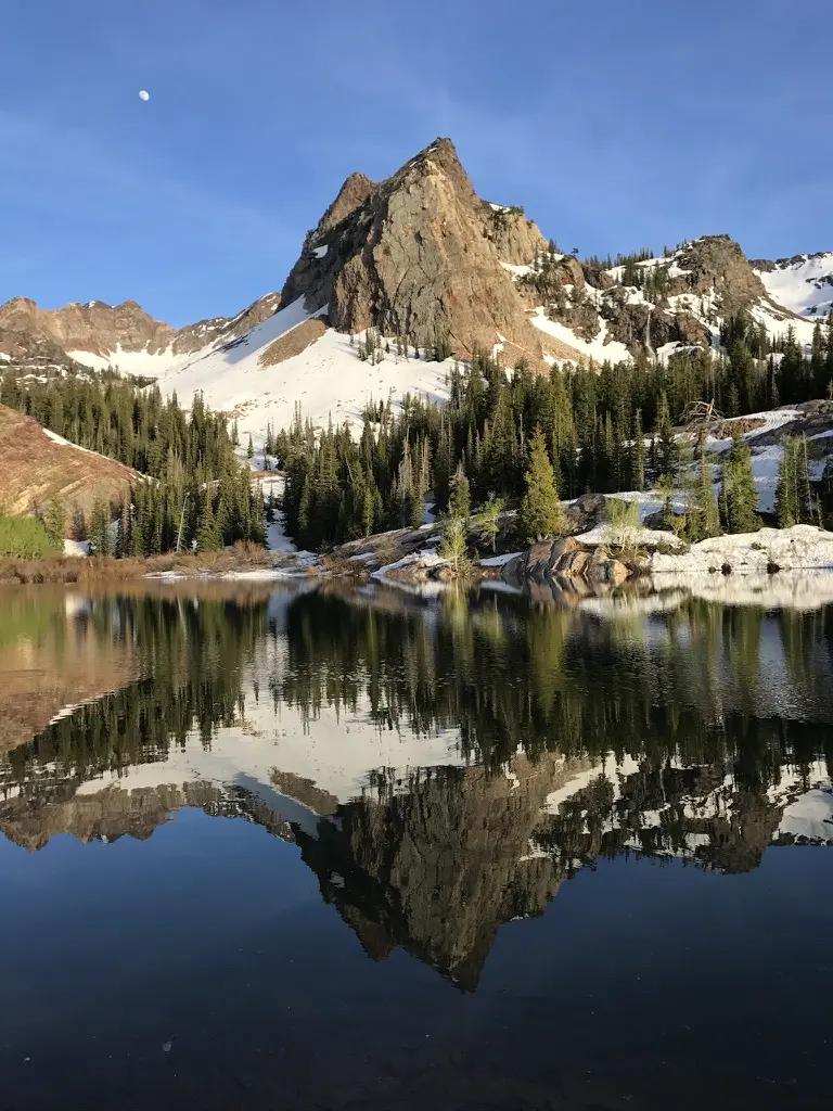 Sundial Peak reflected in a calm alpine lake